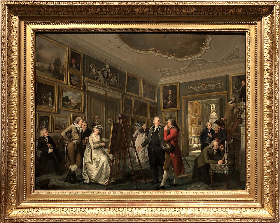 A Dutch picture gallery in a painting: gilt-framed pictures hung in groups on the walls of a high room, with visitors standing below